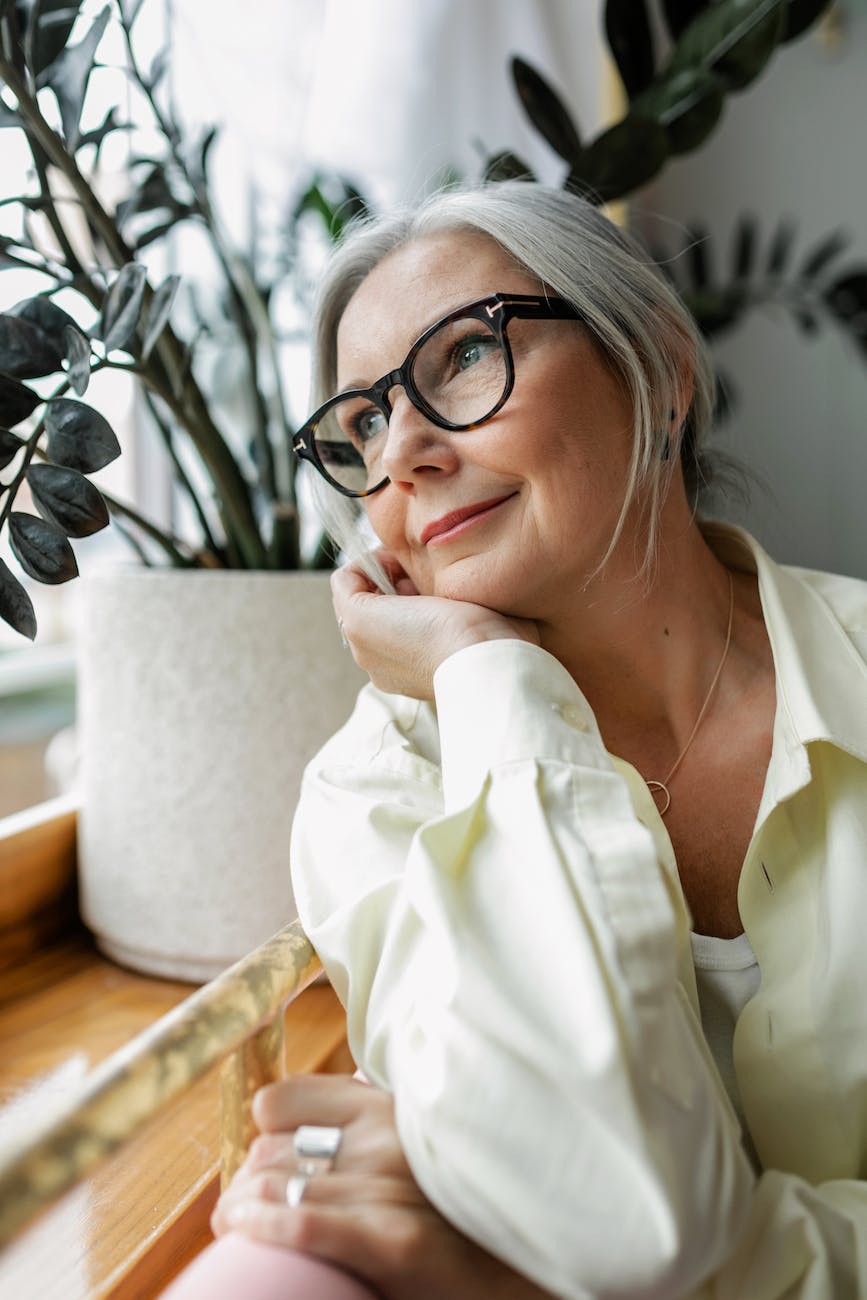 elderly woman wearing black framed eyeglasses